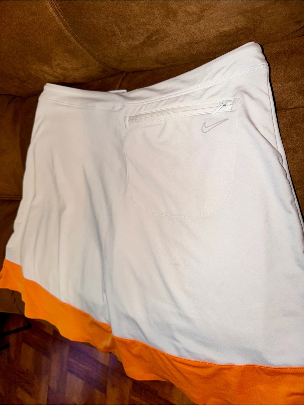 Nike White Women’s Tennis Skort with Orange Hem